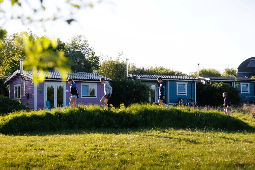 Children running wild at Pure Space glamping woodland, Loop Head Peninsula, Clare