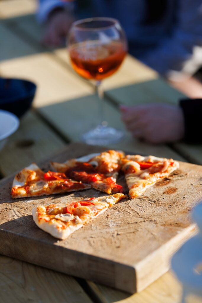 Pizza and wine in the sun at Pure Space glamping, Loop Head Peninsula, County Clare, Ireland